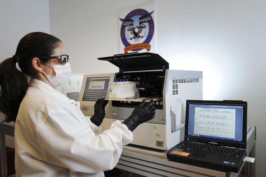 An FBI Laboratory professional performs nuclear DNA analysis. (Image: FBI)