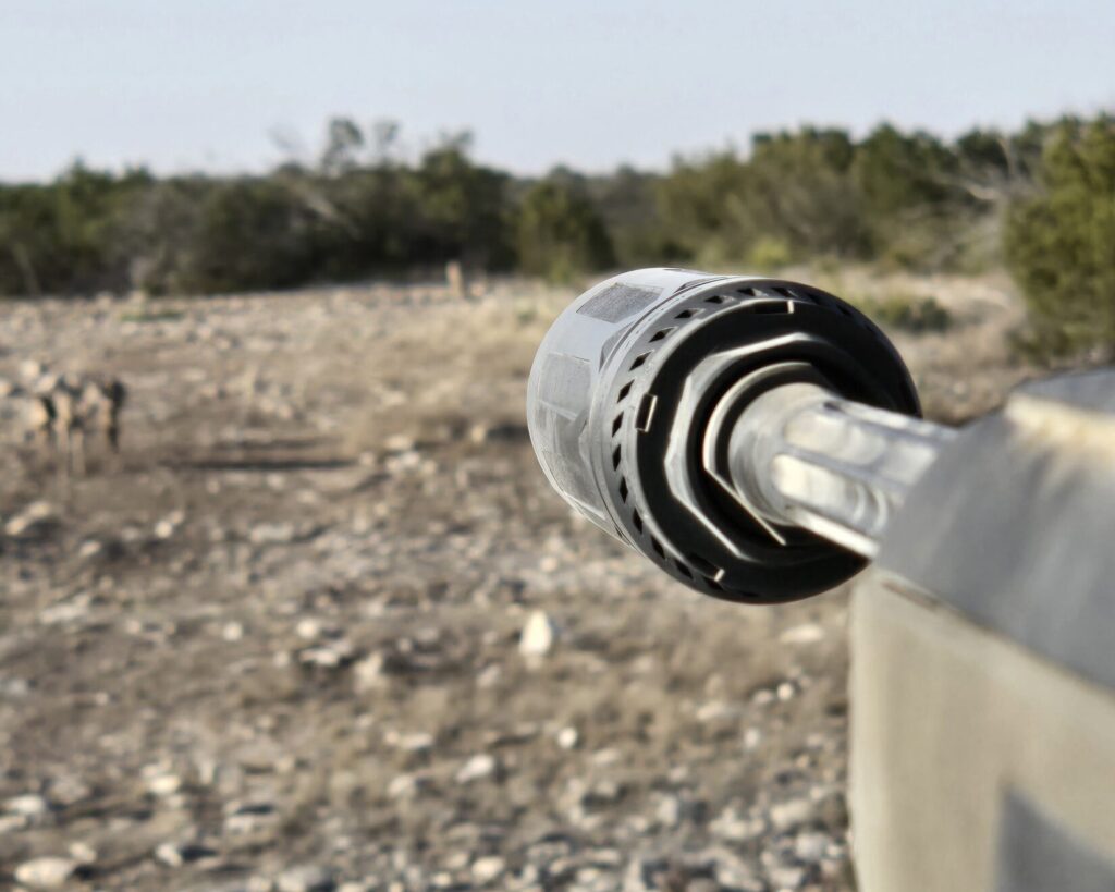 A rifle suppressor on the end of a barrell, which can shift point of impact if not verified