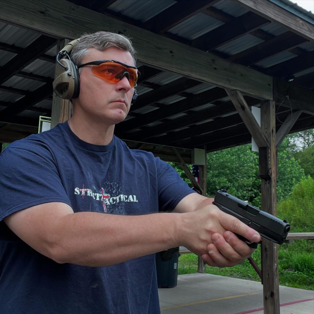 Ken Stretz using the amber lenses while waiting for his RX lenses helped him see his front sight clearer