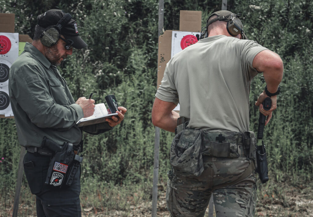Rick Hogg of War HOGG Tactical collecting shooting data from a police officer student