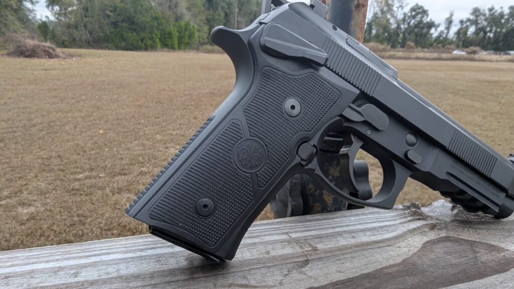 Close-up of the Beretta 92GTS grip and the frame-mounted Type G decocker.