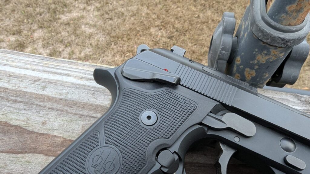 Close-up of the Beretta 92GTS grip and the frame-mounted Type G decocker.