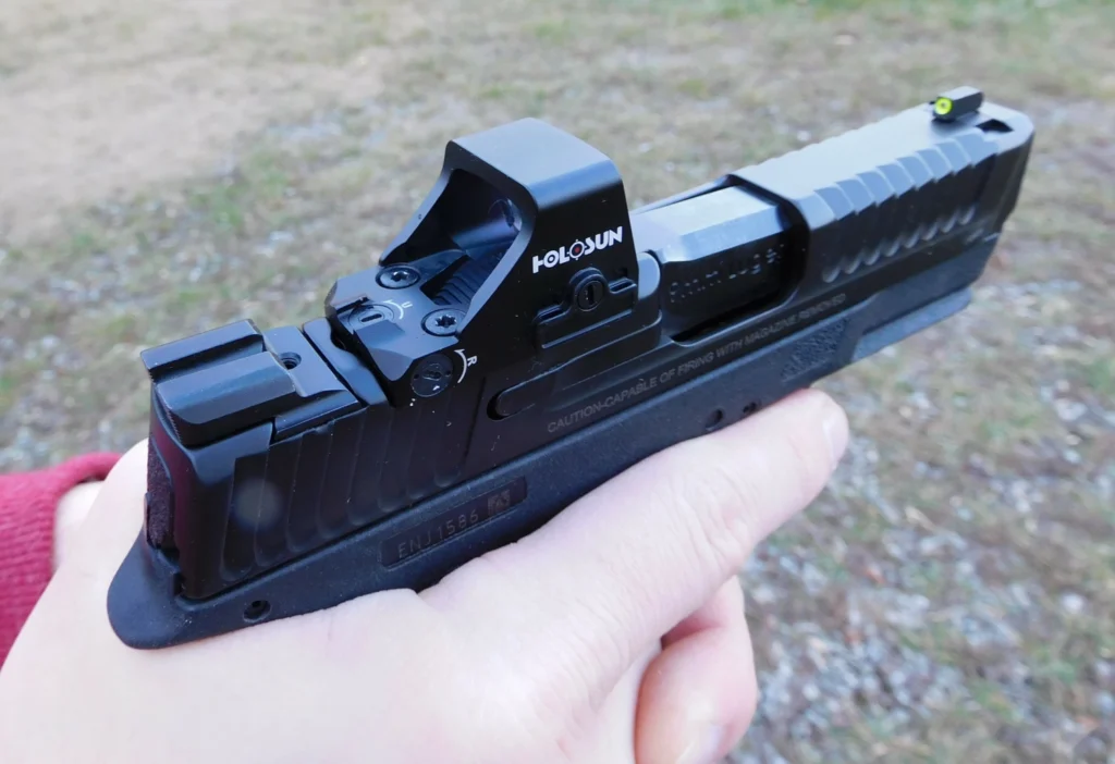 A Holosun 407K X2 red dot on a semiautomatic pistol