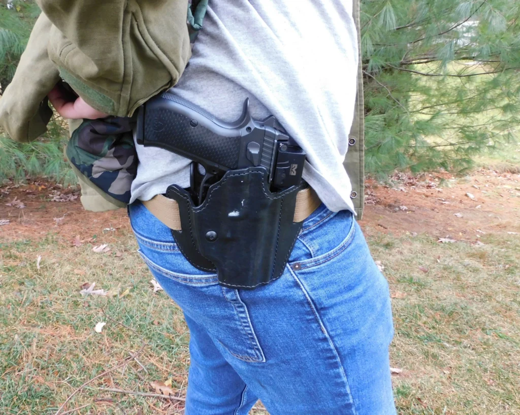 Man carrying a semiauto pistol in a Bianchi 126 GLS Assent Pro-Fit holster