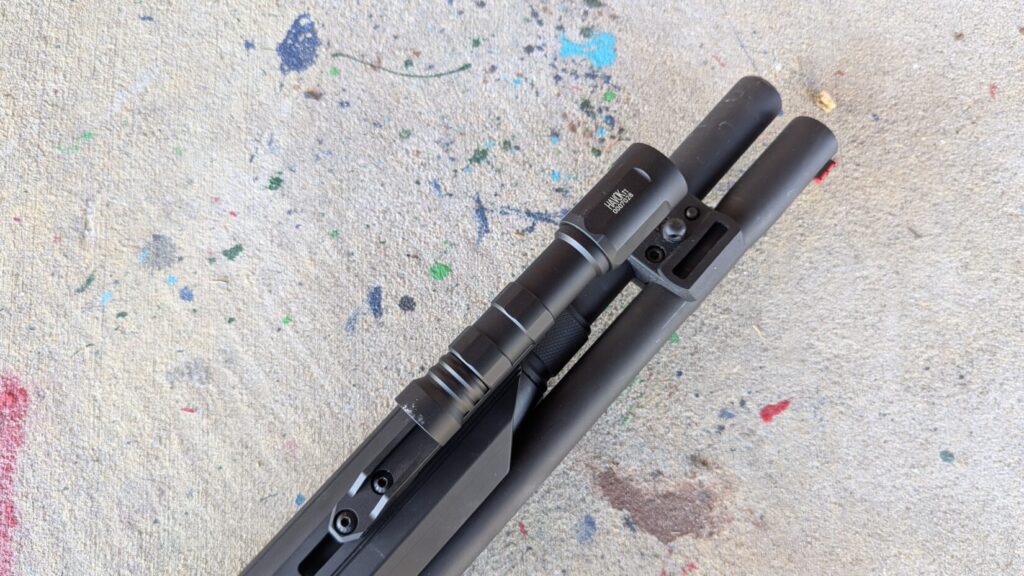 View of the Modlite Havok and its mount on the underside of the shotgun barrels/magazine tube.