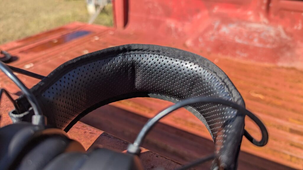 Close-up of the perforated, cushioned headband of the Safariland electronic ear protection.