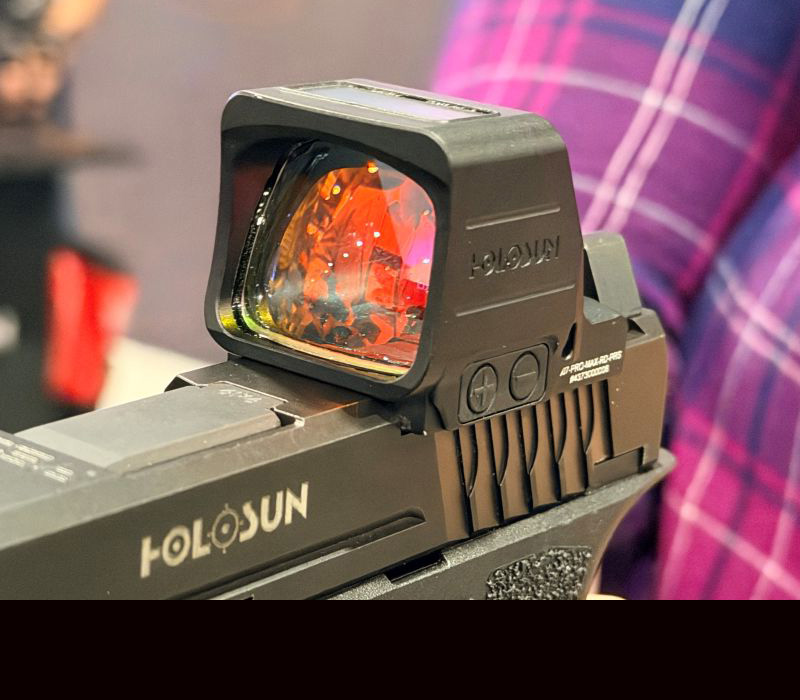 A view of the front of an optic mounted on a handgun, showing how large the window of the optic is.