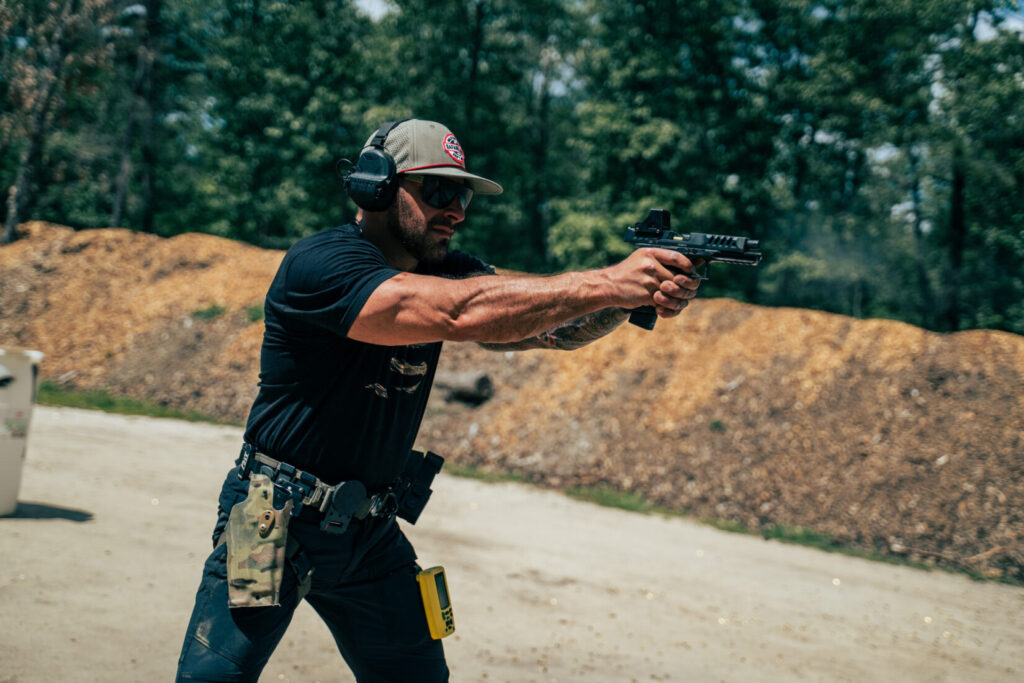 Paul Costa shooting a Walther PDP handgun