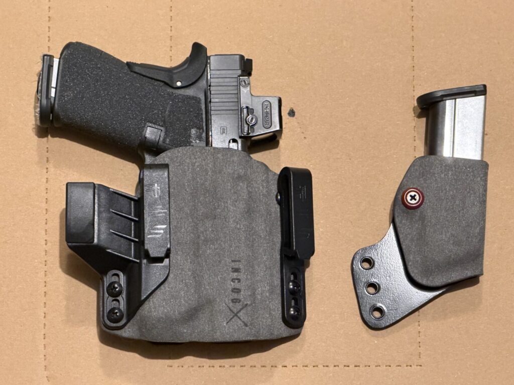 Ken Stretz of Stretz Tactical's G48 in his current EDC holster - the Safariland incog. shown with optional mag pouch