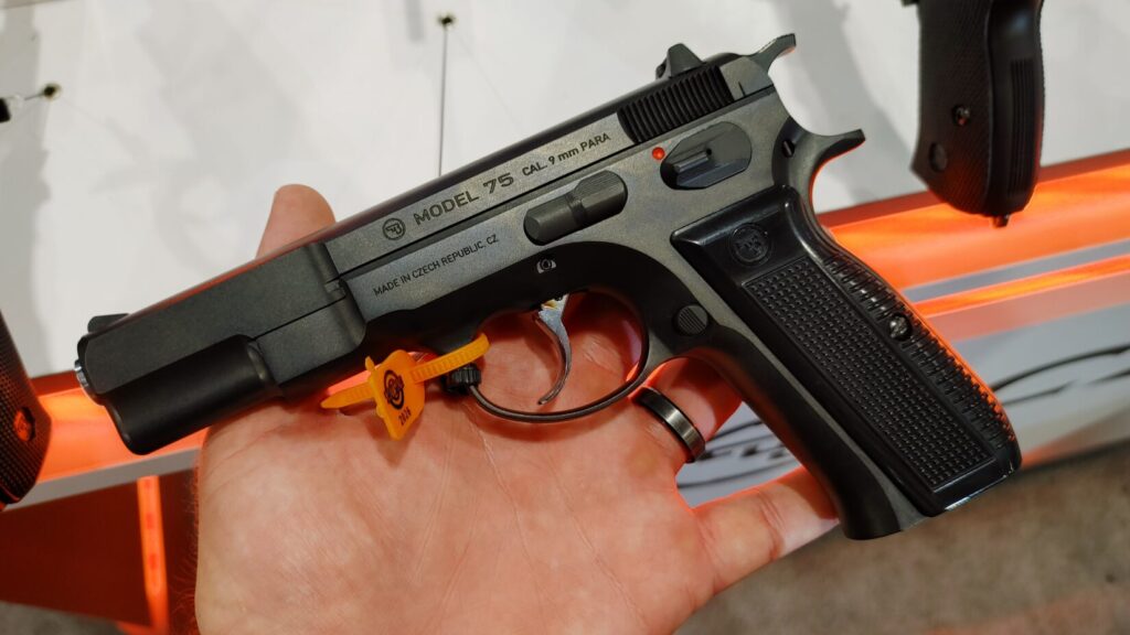 A classic CZ 75 "Pre-B" model 9mm pistol with its original high-gloss finish and spur hammer.