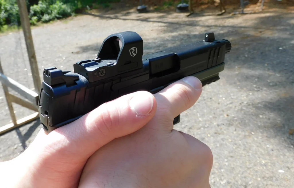 Pistol optic mounted on a handgun