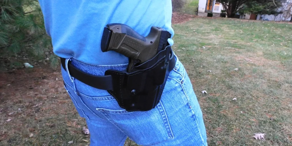 Walther P99 concealed carry pistol and Safariland 637 holster on a man's hip
