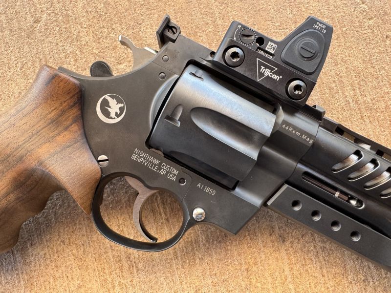 The Trijicon RMR Sight Adjustable LED 3.25 MOA Red Dot Type 2 with a Low Profile Picatinny Rail works perfectly on the Korth NXR. 