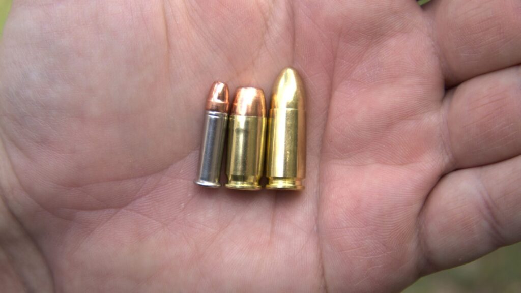 cartridge comparison: 22 long rifle, 380 acp, 9mm luger from left to right