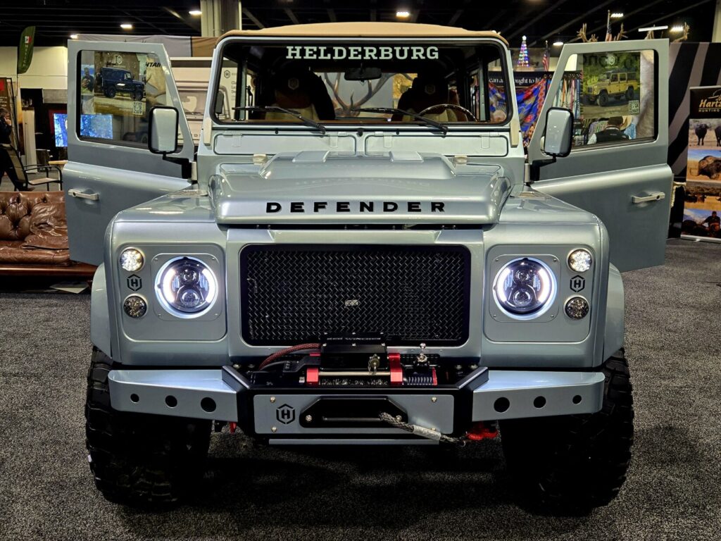 An offroad vehicle with doors open as seen from the front