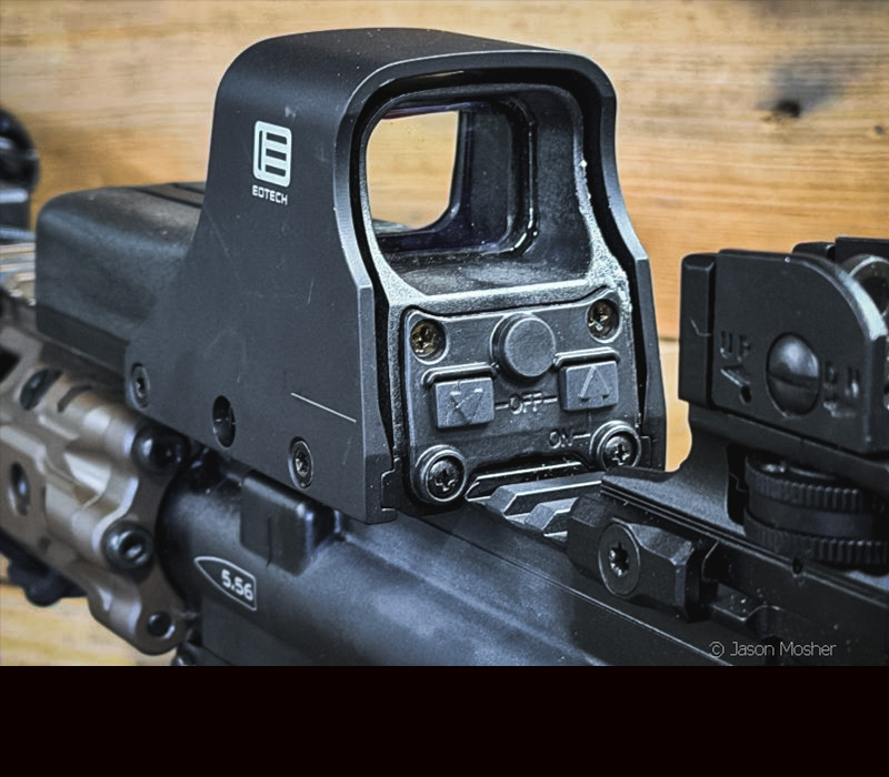 The back of an Eotech optic, showing the two larger control buttons. 