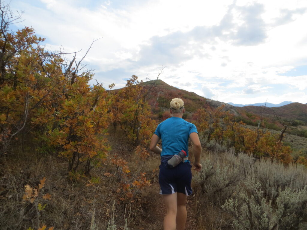 female jogger on a mountain trail