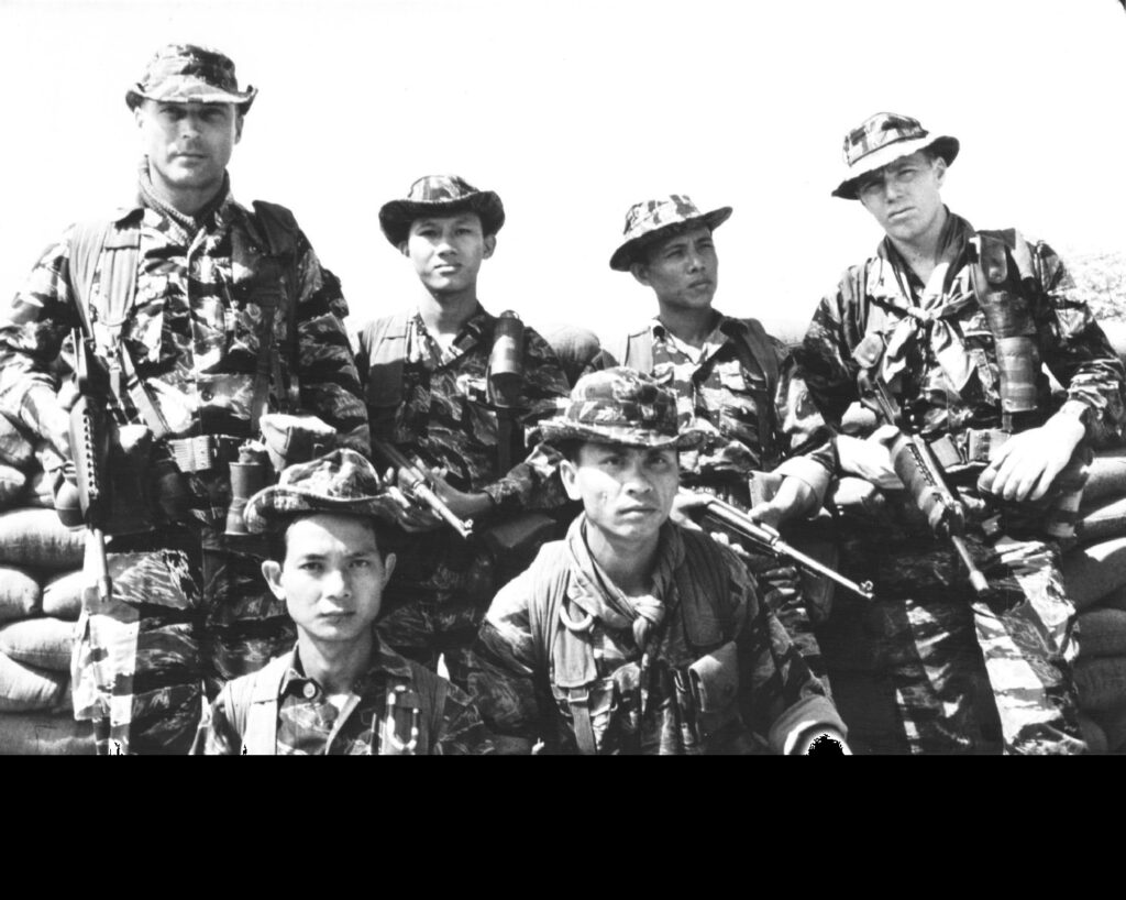 Group of Soldiers from ARVN with SFC Norman A. Doney, 5th S.F. Group Abn., 1st S.F., Vietnam, Sept. 1968. (United States Army Heritage and Education Center)