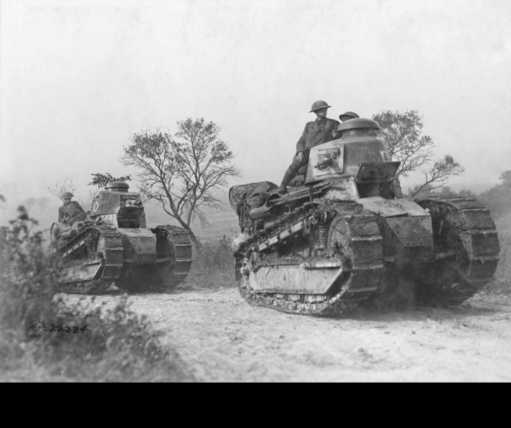 American troops going forward to the battle line in the Forest of Argonne. France, September 26, 1918. (Department of Defense. Department of the Army. Office of the Chief Signal Officer. Collection of National Archives at College Park)