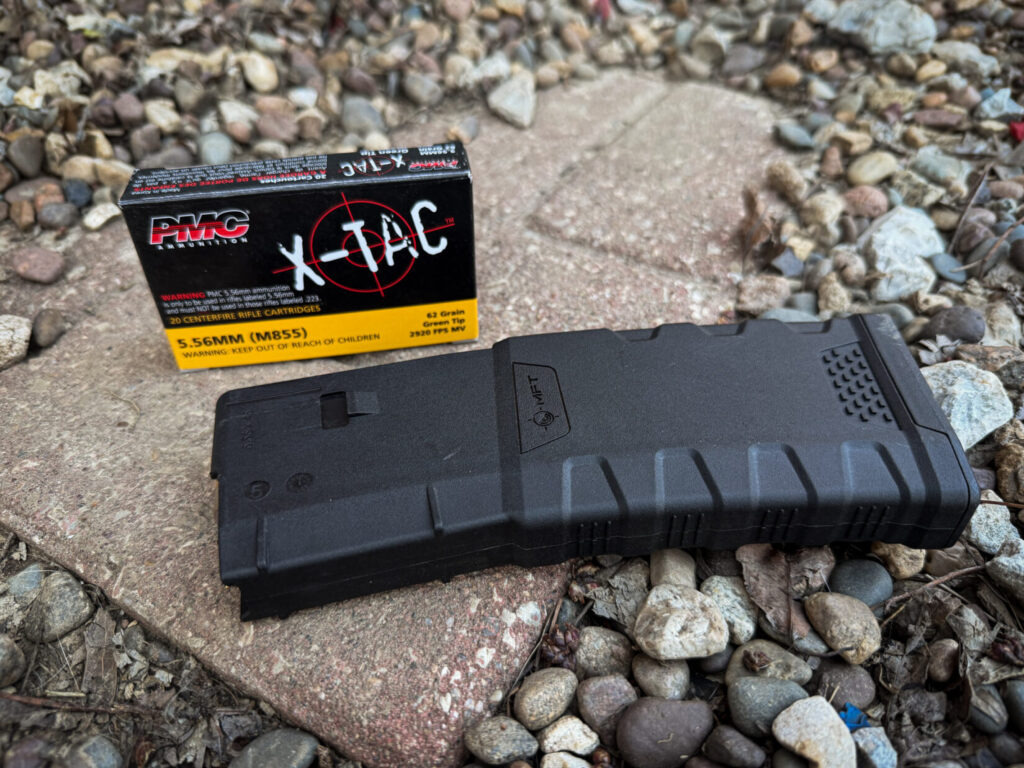 AR-15 magazine with a box of ammunition