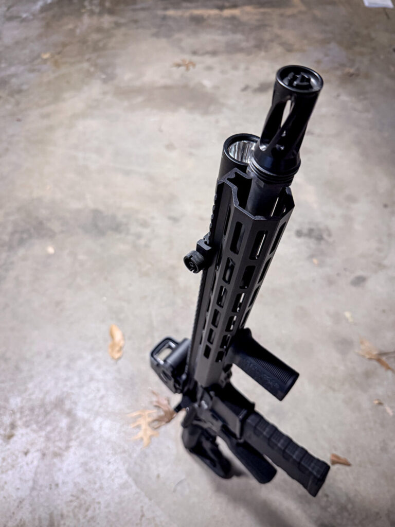 black AR-15 on a gray background