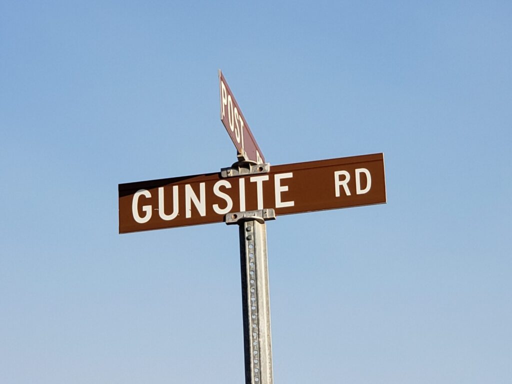 A road sign against a blue sky background