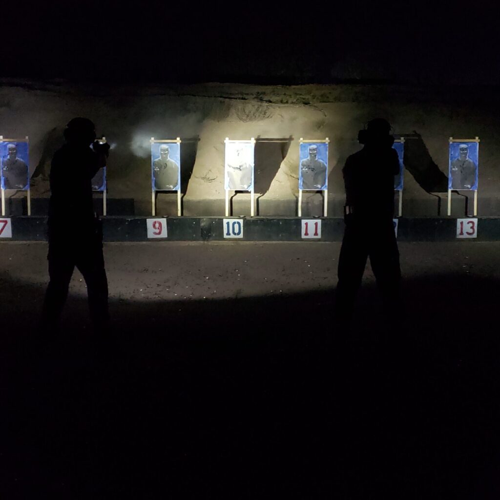 Targets illuminated by flashlight at night at Gunsite Academy