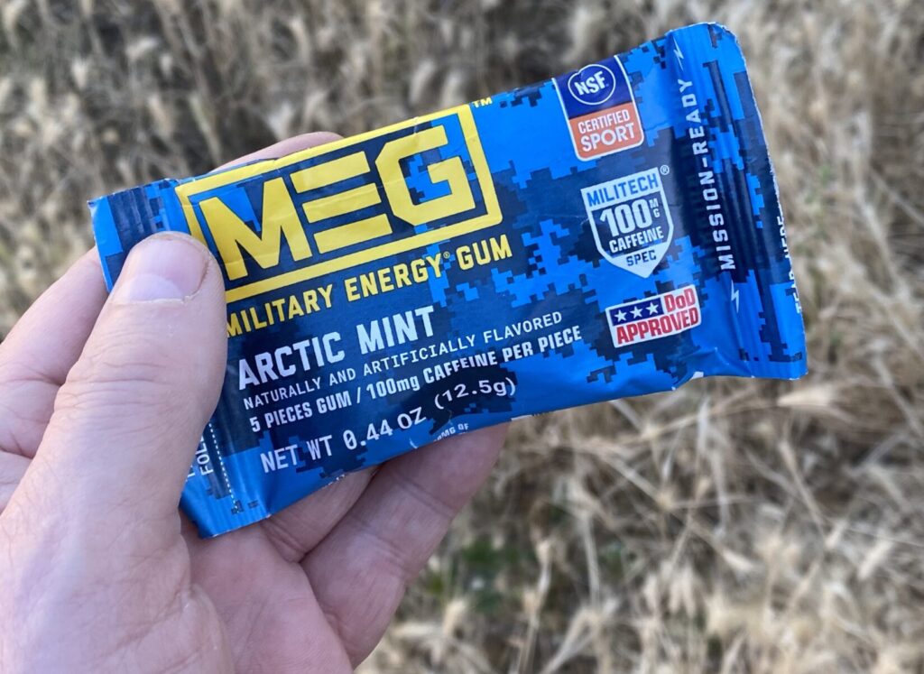 hand holding a package of Military Energy Gum
