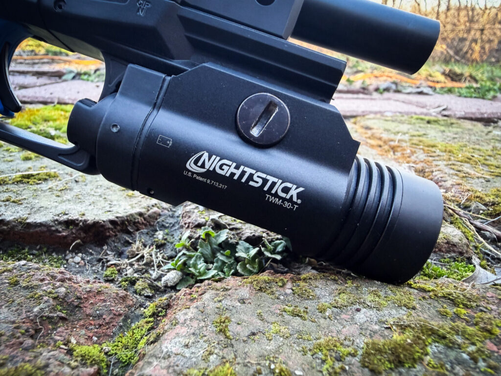 Nightstick weapon-mounted handgun light