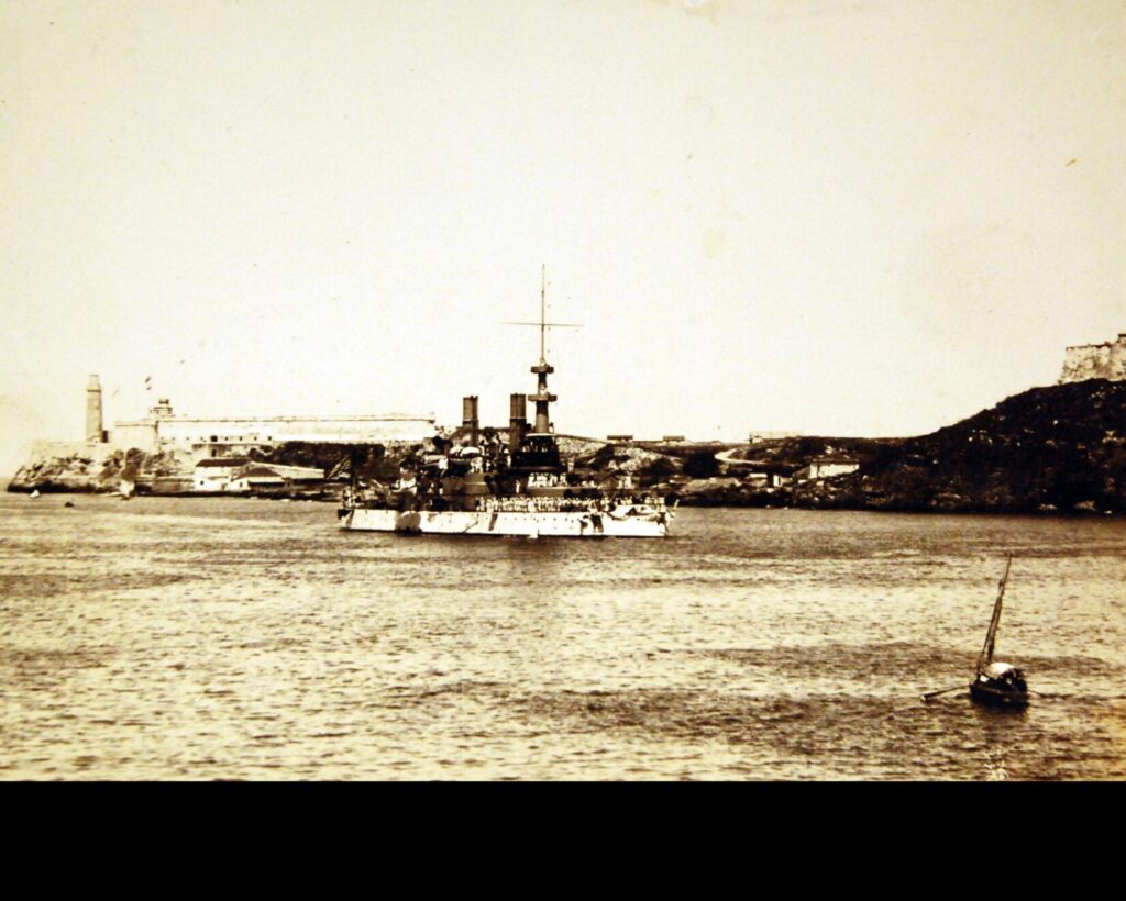 USS Iowa (Battleship No. 4) Passing Morro Castle and the Cabaña Fortress, Spanish‑American War, 1898.