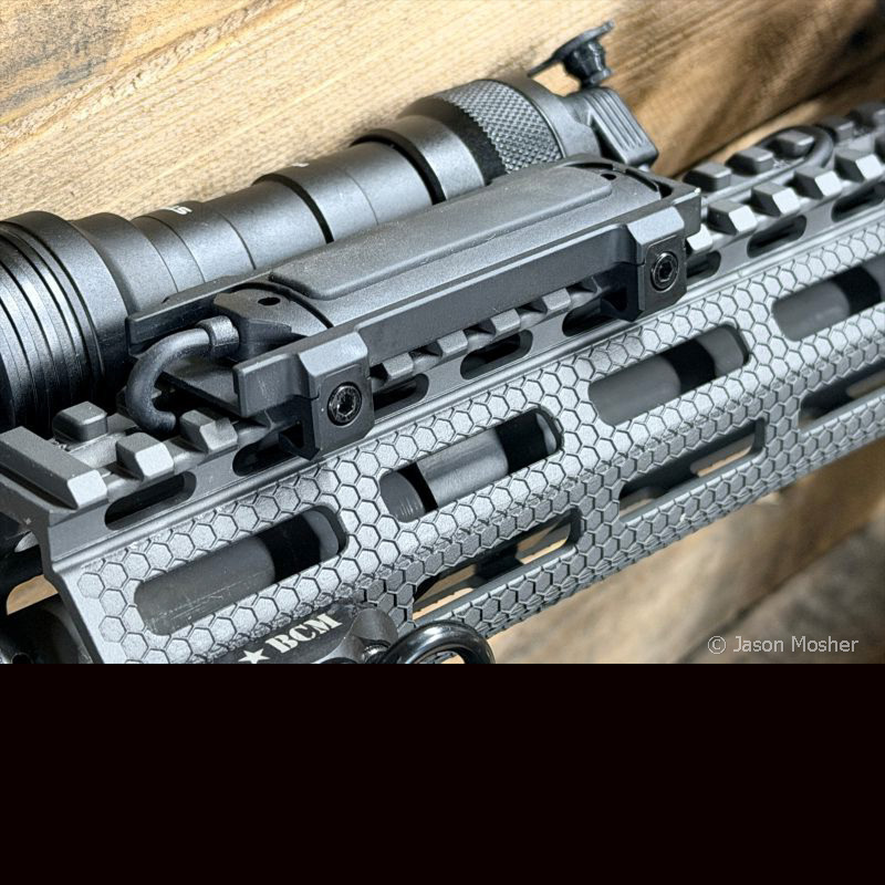 A close up view of the remote switch in a metal bracket for the IR PRO light.