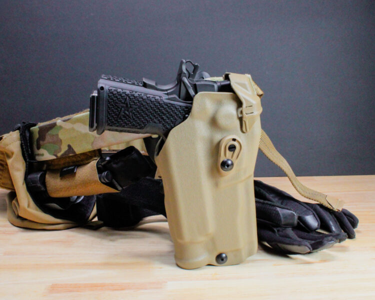 Staccato C2 in a Safariland Holster with a black background.