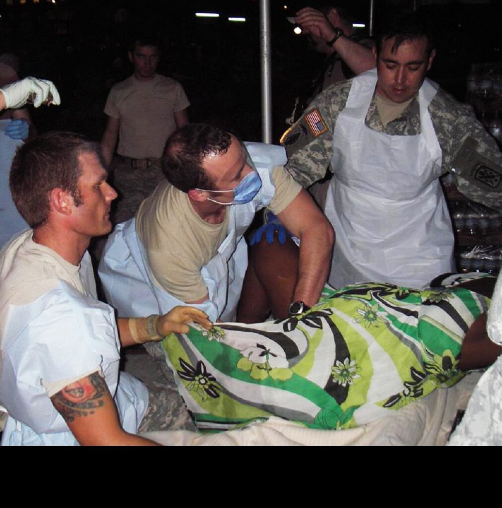 Soldiers from the 98th Civil Affairs Battalion, 95th Civil Affairs Brigade, deliver a baby while deployed to Haiti in support of Operation Unified Response—the U.S. military’s mission following the 2010 Haiti earthquake. The mother shared that if the baby had been a boy, she would have named him “Sam” after Uncle Sam. Since it was a girl, she named her “Samantha.” (98th Civil Affairs Battalion, 95th Civil Affairs Brigade, U.S. Army)
