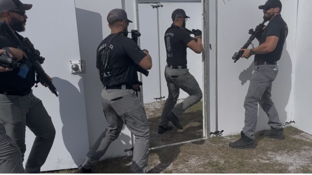 Pictured is law enforcement officers conduct close quarters battle during a War HOGG Tactical course