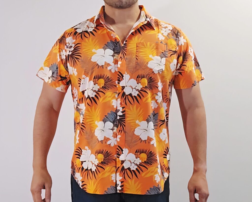 A man in a Hawaiian shirt against a white background