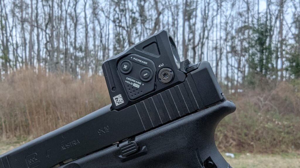 Detailed view of the Aimpoint COA mounted on a Glock 47 slide, showcasing the A-CUT system's ability to sit the optic exceptionally low.