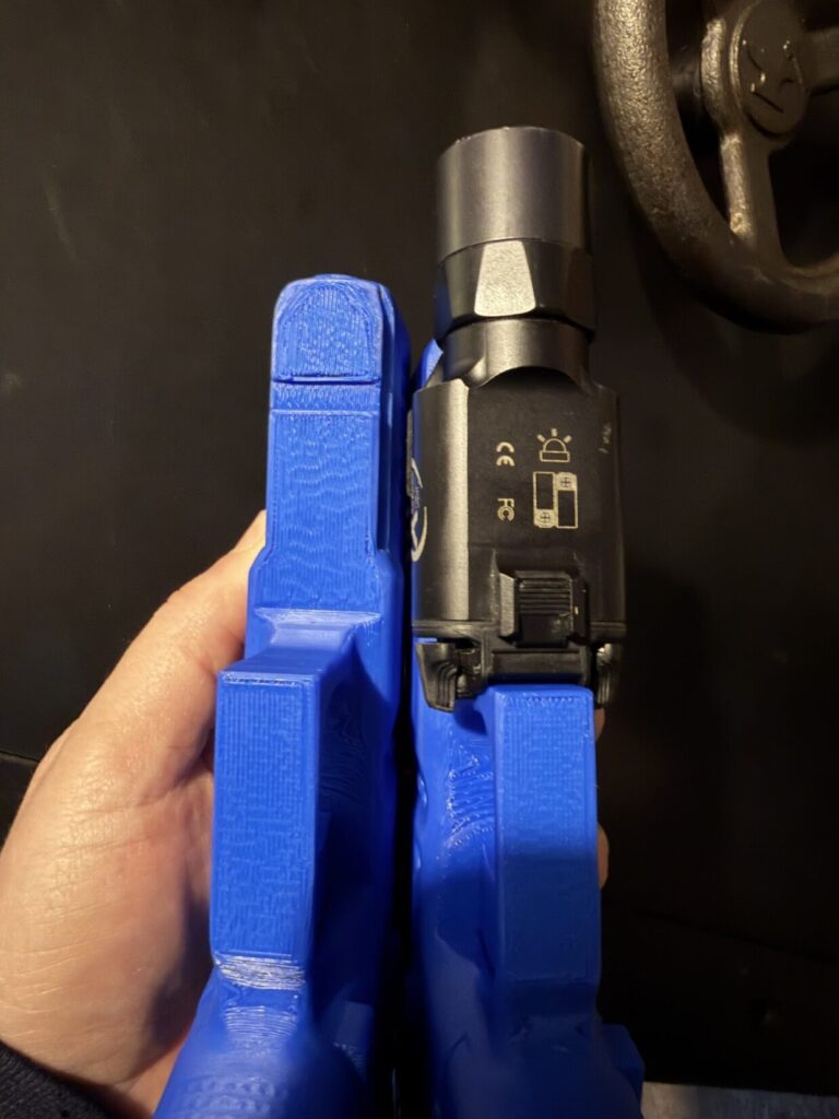 Grip keeper g17 without a light and with a surefire light