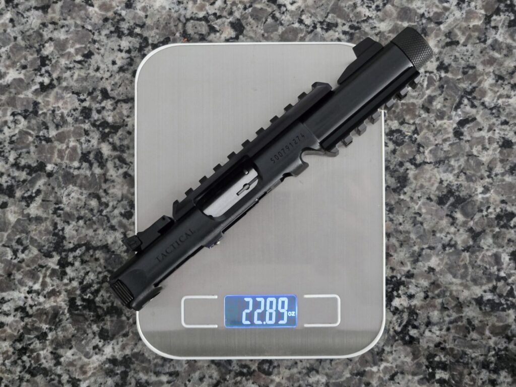 A pistol upper on a kitchen scale