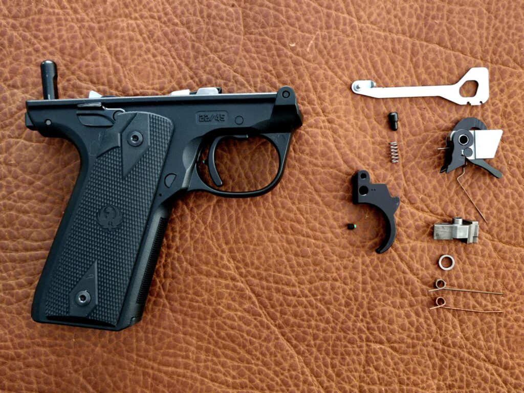A pistol lower with parts removed