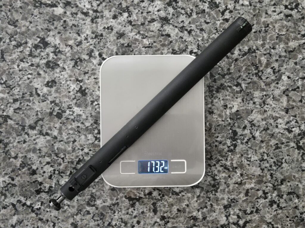 A pistol barrel on top of a kitch scale