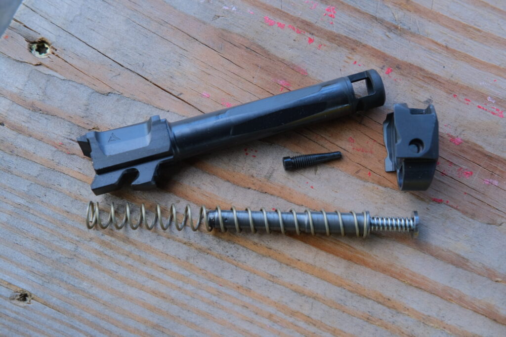 Radian Ramjet and Afterburner in its component parts with a DPM Recoil System guide rod.