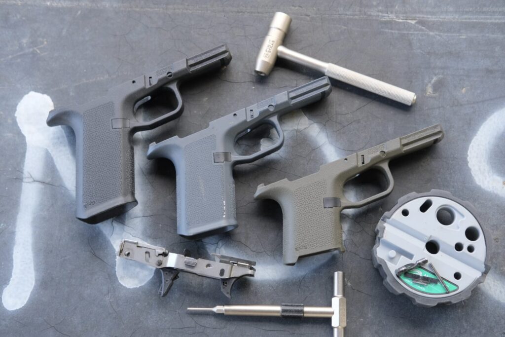 3 Ruger RXM Magpul Grip frames with armorers tools