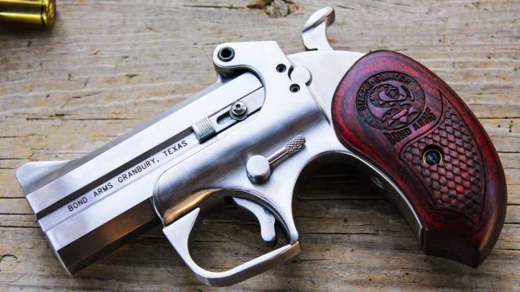 Derringer on a wooden table.