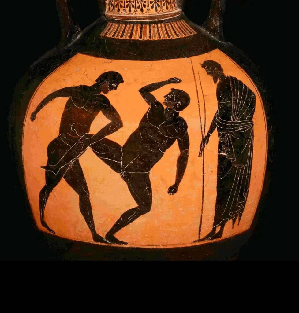 Pankratiasts competing on a Panathenaic amphora. A single arm, leg hold and heave move, made with the other hand poised to strike