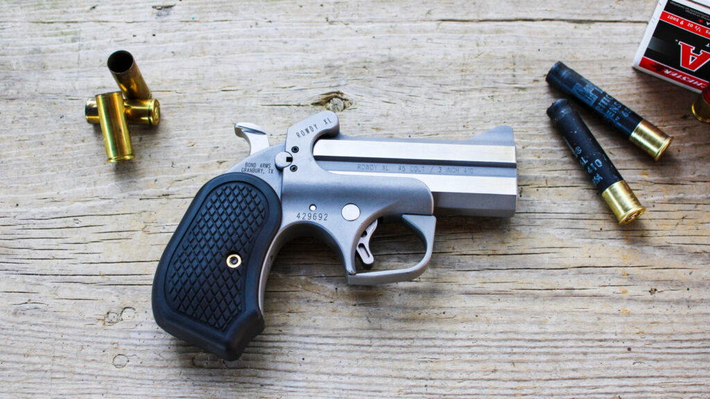 Derringer on a wooden table.
