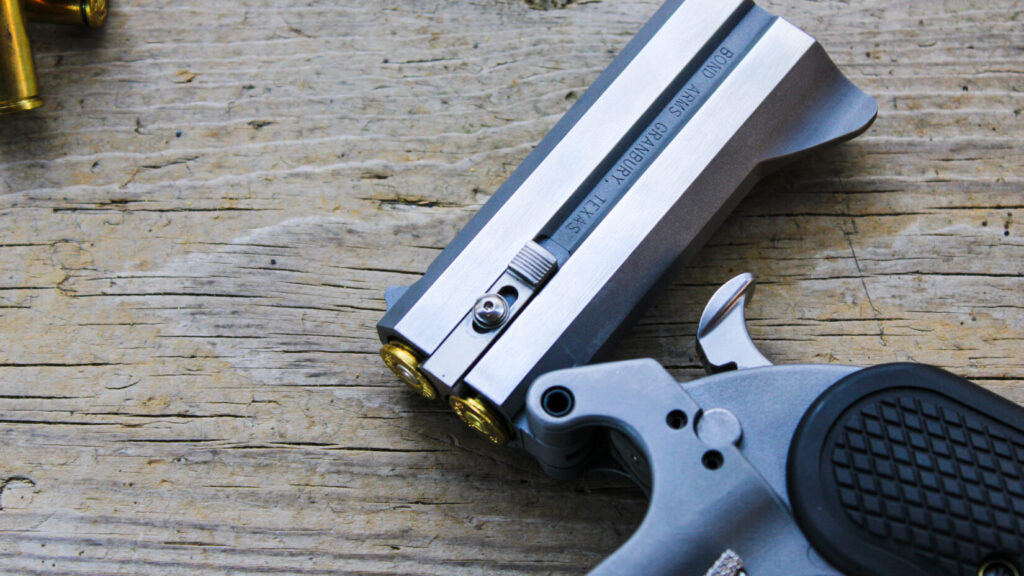 Derringer on a wooden table.