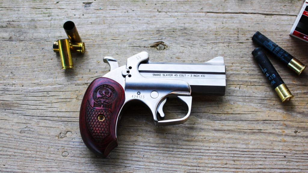 Derringer on a wooden table.