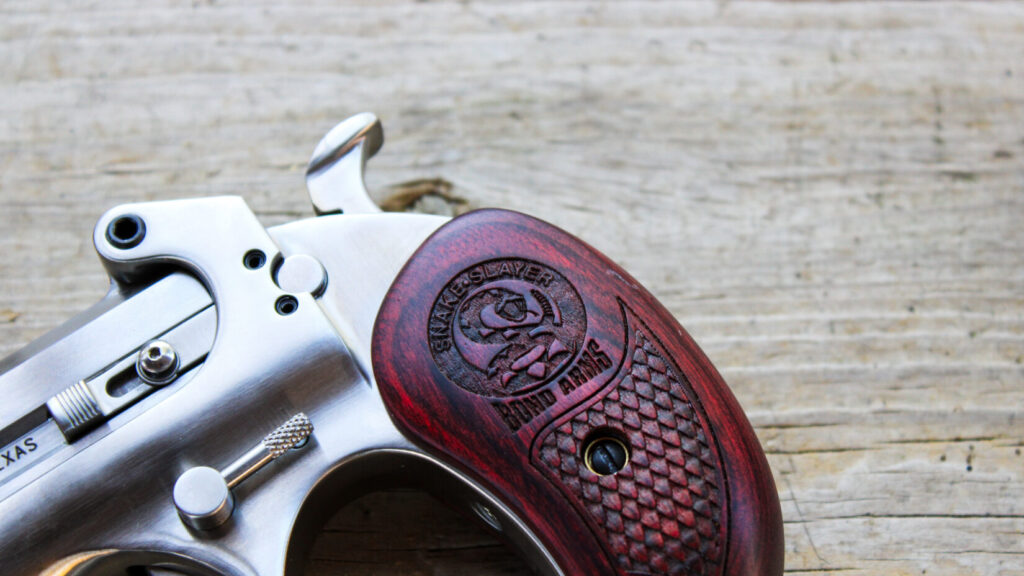 Derringer on a wooden table.