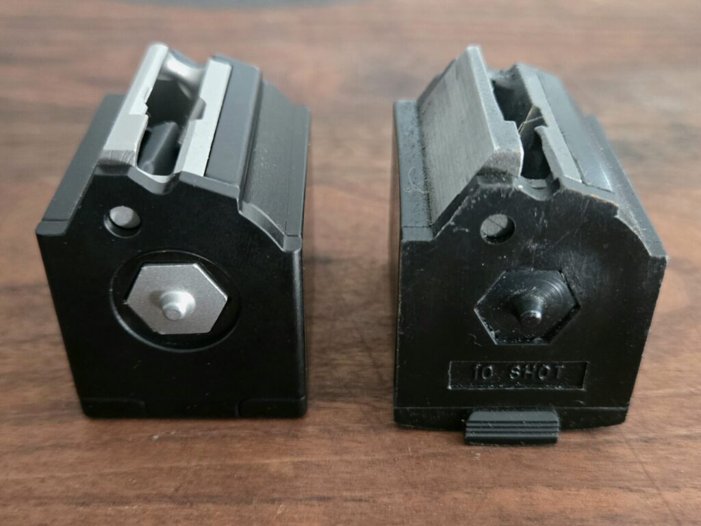 Two rotary rimfire rifle magazines