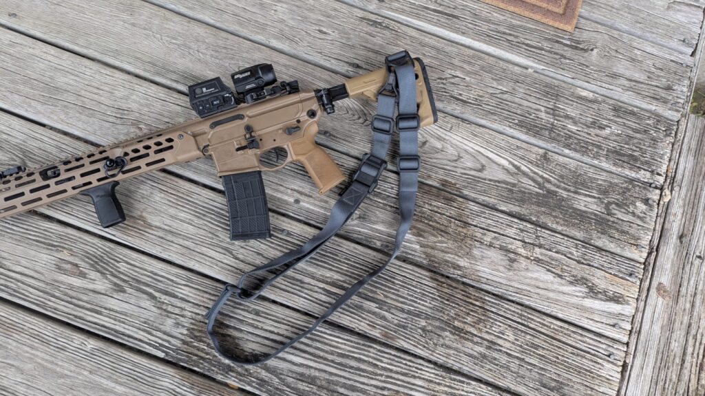 The MS1 sling draped over the receiver and stock in onje point mode